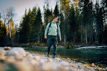 Wall Mural - person walking in the woods