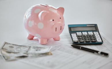 Piggy bank, calculator or cash for savings, budget or income security for future financial freedom. Inflation, money closeup or funding for rainy day expenses with dollars, economy or wealth growth