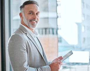Fototapete - Businessman, tablet and website in office portrait, sales and online for market research. Mature person, window and app for statistics in workplace, information and graph for strategy or project