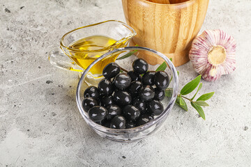 Wall Mural - Black olives with oil and branch