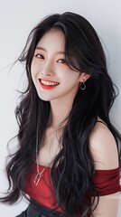 Wall Mural - A smiling Korean woman with long black hair and a beautiful smile