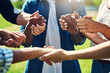 © Penn/peopleimages.com - Friends, holding hands and people with group in outdoor therapy for hope, empathy or faith. Solidarity, circle and person in counseling for addiction, mental health or support with trust or kindness