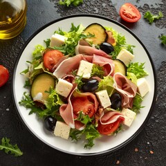 Wall Mural - Fresh salad - Delicious fresh salad with tomatoes, lettuce, eggplant, zucchini, cheese, Parma ham and olive oil.