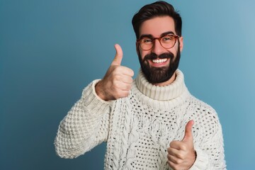 Wall Mural - Young handsome man with beard wearing casual sweater and showing thumb up