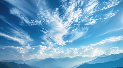 Wall Mural - Scenic sky with clouds above mountains