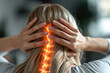 © Anna - Closeup of a woman holding her neck with glowing spine illustration. Health, chiropractic care, pain relief, spinal treatment, medical diagnosis concept.