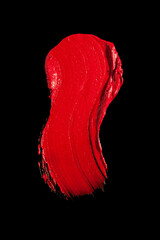 Wall Mural - Lipstick red satin finish isolated on a black background