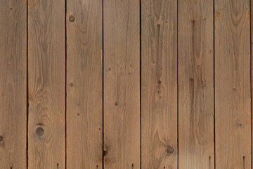 Poster - A weathered wooden fence with vertical planks