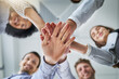 © AK Coop/peopleimages.com - Office, circle and hands of business people for teamwork, collaboration and solidarity for about us. Corporate staff, diversity and low angle of workers for support, partnership and company pride