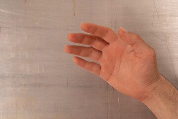 Poster - An open palm reaching towards the viewer