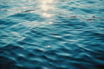 A sunny day with bright sunlight reflecting on the surface of the water