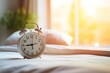 © ORG - Close-up focus on the alarm clock set for the morning on the bedside table in the bedroom.