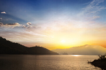 Wall Mural - blue sky and yellow sunlight in sunrise