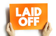 © dizain - Laid Off - means that your employer is terminating your contract, text concept on card
