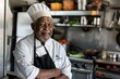 © Baba Images - Portrait of a senior male chef in professional kitchen