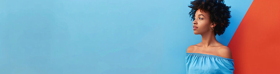 Poster - Photo of A woman in blue dress standing on the right side with copy space area, solid color background. Web banner with copyspace on left


