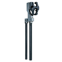 Fototapete - A mechanical tool with a rectangular metal body and two metal prongs sticking out in opposite directions. A central metal cylinder runs through the body and a beltlike structure.
