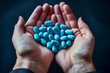 © -=RRZMRR=- - womens hands hold blue pills in close-up