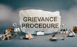 © Nastassia - Grievance Procedure Written on Crumpled Paper With Paperclips