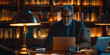 © Maestro - Mature man working late in a cozy library with warm lighting