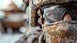 © familymedia - A detailed close-up of a soldier's gear and equipment, including camouflage uniform and tactical gear, emphasizing the meticulous preparation for military operations.