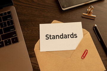 Poster - There is word card with the word Standards. It is as an eye-catching image.