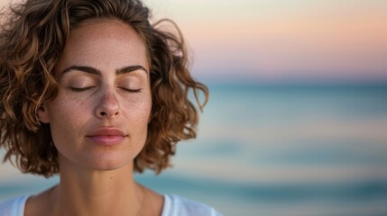 Wall Mural - woman enjoying peaceful moment at beach