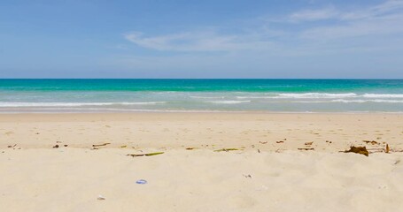 Wall Mural - Phuket beach sea Thailand. Landscapes view of beach sea sand and sky in summer day. Beach sea space area. At Karon Beach, Phuket, Thailand. On 9 January 2024. High quality video 4K DCI ProRes422