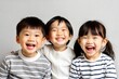 © N7 - Joyful Asian Kids Smiling
