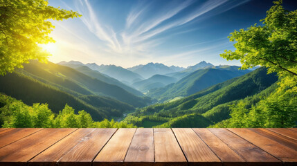 Poster - Empty wooden tabletop with a breathtaking view of a mountain valley bathed in the golden light of sunrise