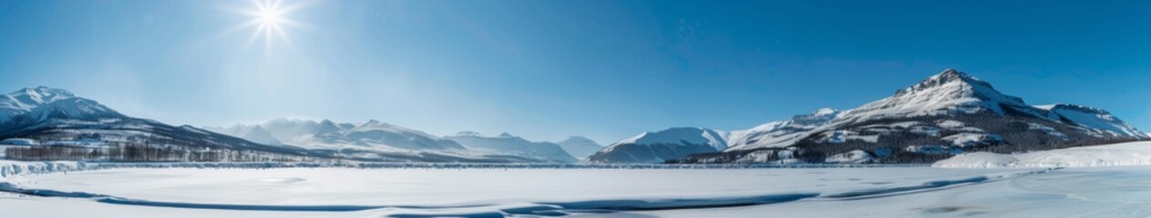 Wall Mural - Beautiful Winter Landscape with Snow-Covered Mountains and Frozen Lake Under Clear Blue Sky, Capturing the Essence of Seasonal Change, Holiday Getaways, and Natural Beauty for Stress Relief and Relaxa