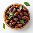 © Liyomax - Dried date and green mint in a bowl on white table close up. generated by AI