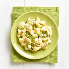 Wall Mural - Potato salad with egg, pickle, green onion with mayonnaise and y