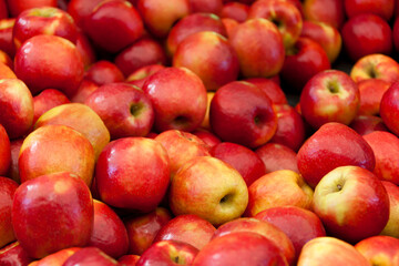 Apples on a market stall in Harbour Town, Queensland, Australia. Full-frame, Background.