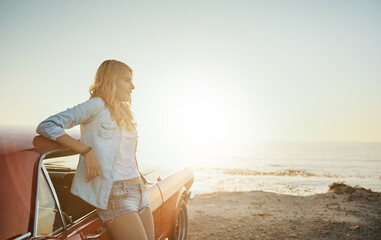 Poster - Car, sunset and view with woman on road trip to beach for holiday, travel or vacation in summer. Horizon, peace and thinking with tourist outdoor in nature for adventure, drive or journey to coast