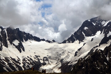 Poster - Beautiful view of the Caucasus mountains with people. Dombai. The natural landscape.