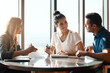 © ReeseArcurs/peopleimages.com - Meeting, couple and financial advisor with contract for consulting, insurance plan or investment in office. Discussion, help and woman broker with people for advice, loan application or information
