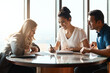 © ReeseArcurs/peopleimages.com - Meeting, couple and financial advisor with document for consulting, insurance plan or investment in office. Discussion, help and woman broker with people for advice, loan application or information