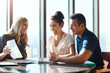 © ReeseArcurs/peopleimages.com - Help, couple and financial advisor with document for consulting, insurance plan or investment in office. Discussion, advice and woman broker with people for meeting, loan application or information