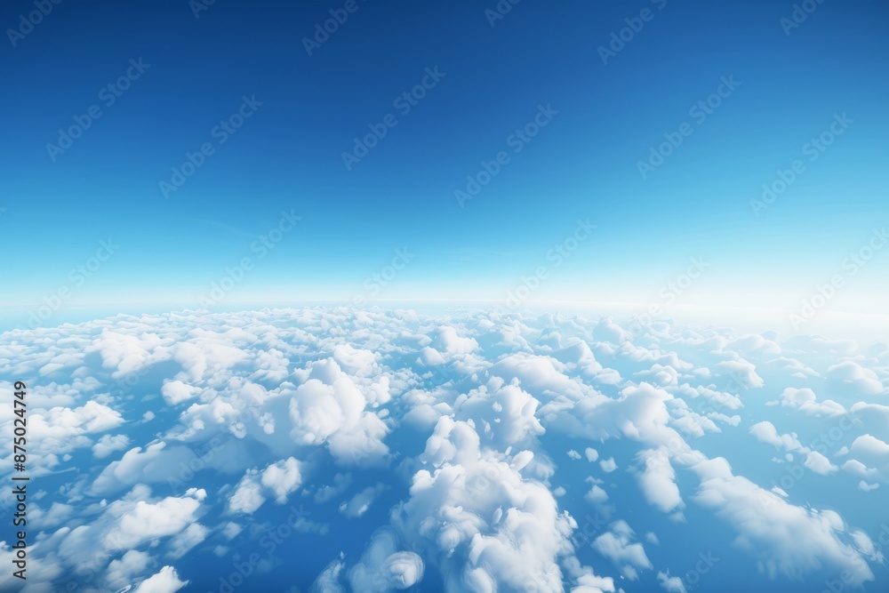 A breathtaking view of a clear blue sky with puffy white clouds from an ...