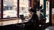 © Felippe Lopes - Woman working on laptop in cozy café with bustling cityscape background