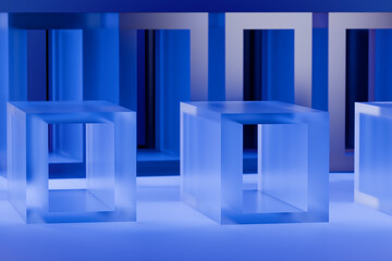 Poster - Transparent glass geometric shapes on a reflective surface with a blue background. 3d rendering