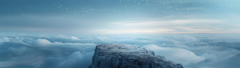 Wall Mural - A mountain peak is covered in clouds and the sky is dark