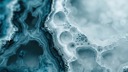 Poster - An abstract image showcasing fluid and smooth textures with bubble formations, creating a visually stunning and calming composition in cool tones.