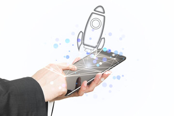 Aufkleber - A person holding a tablet with a drawn rocket launching from the screen, over a white background, symbolizing innovation and technology