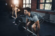 © peopleimages.com - Deadlift, couple and workout with barbell in gym for muscle, wellness and healthy body. Fitness, man and strong woman weightlifting for power, bodybuilding and training together to exercise at club