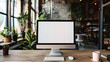 © Mahmud - Blank computer screen on modern office desk stock photo