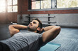 © peopleimages.com - Man, sit ups and gym challenge for wellness with abdomen or exercise, power or fitness for cardio. Male person, body and health club with workout for stomach muscle, athlete training for triathlon