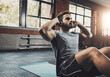 © peopleimages.com - Man, sit ups and gym challenge for exercise with abdomen or cardio, power or fitness for wellness. Male person, body and health club with workout for stomach muscle, athlete training for triathlon