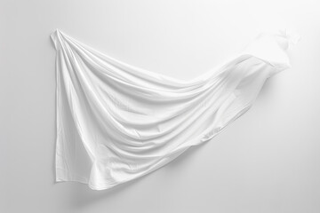 A white cloth is hanging from the wall